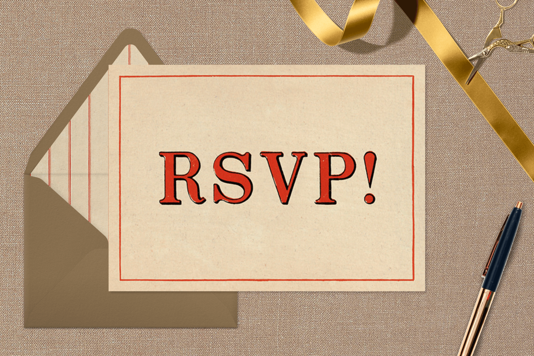 A card reading ‘RSVP’ in red lettering over a brown background with a pen, gold ribbon, and a pair of small scissors.