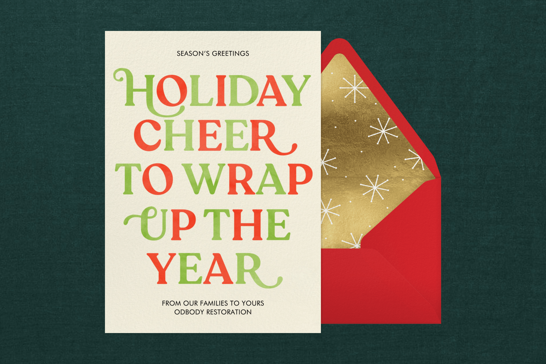 A holiday greeting card with red and green text reading ‘HOLIDAY CHEER TO WRAP UP THE YEAR’. 