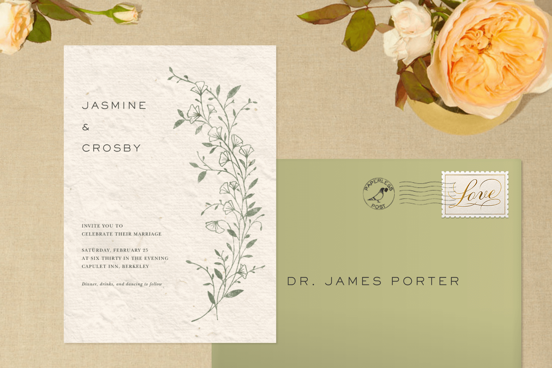 A wedding invitation and envelope on a background with flowers. 