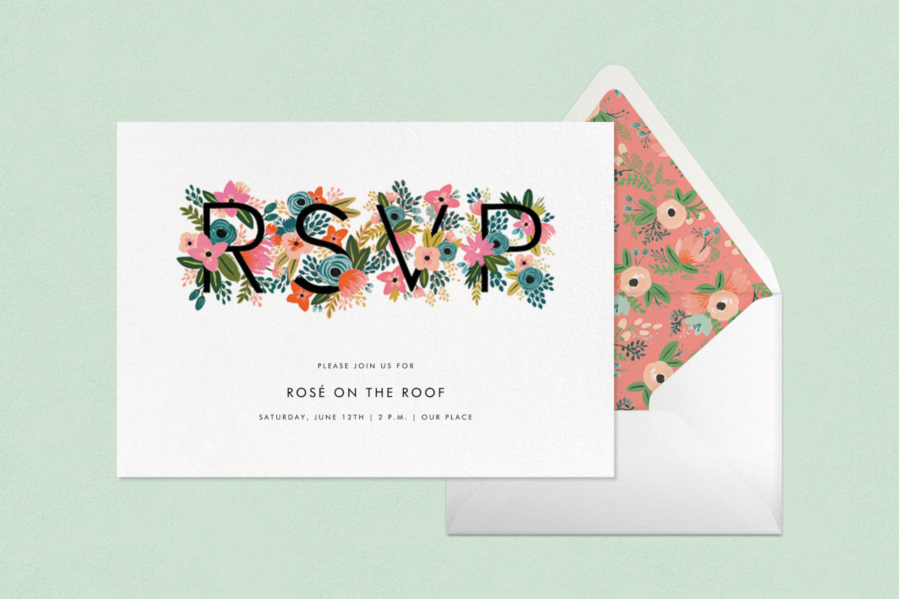 An invitation with black text covered in colorful flowers reading ‘RSVP’. 