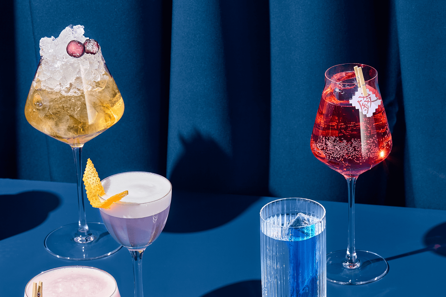 Various cocktails on a table.