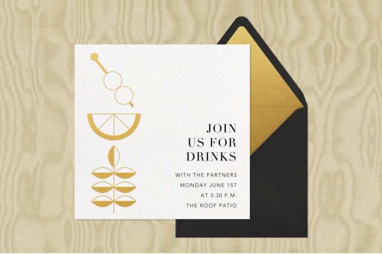 An invitation with a simple gold illustration of an olive pick, citrus wedge, and sprig