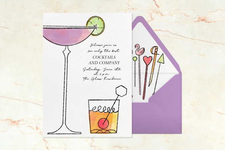 An invitation with a tall coupe glass of purple liquid and a rocks glass with brown liquid and a matching purple envelope and cocktail pick liner.