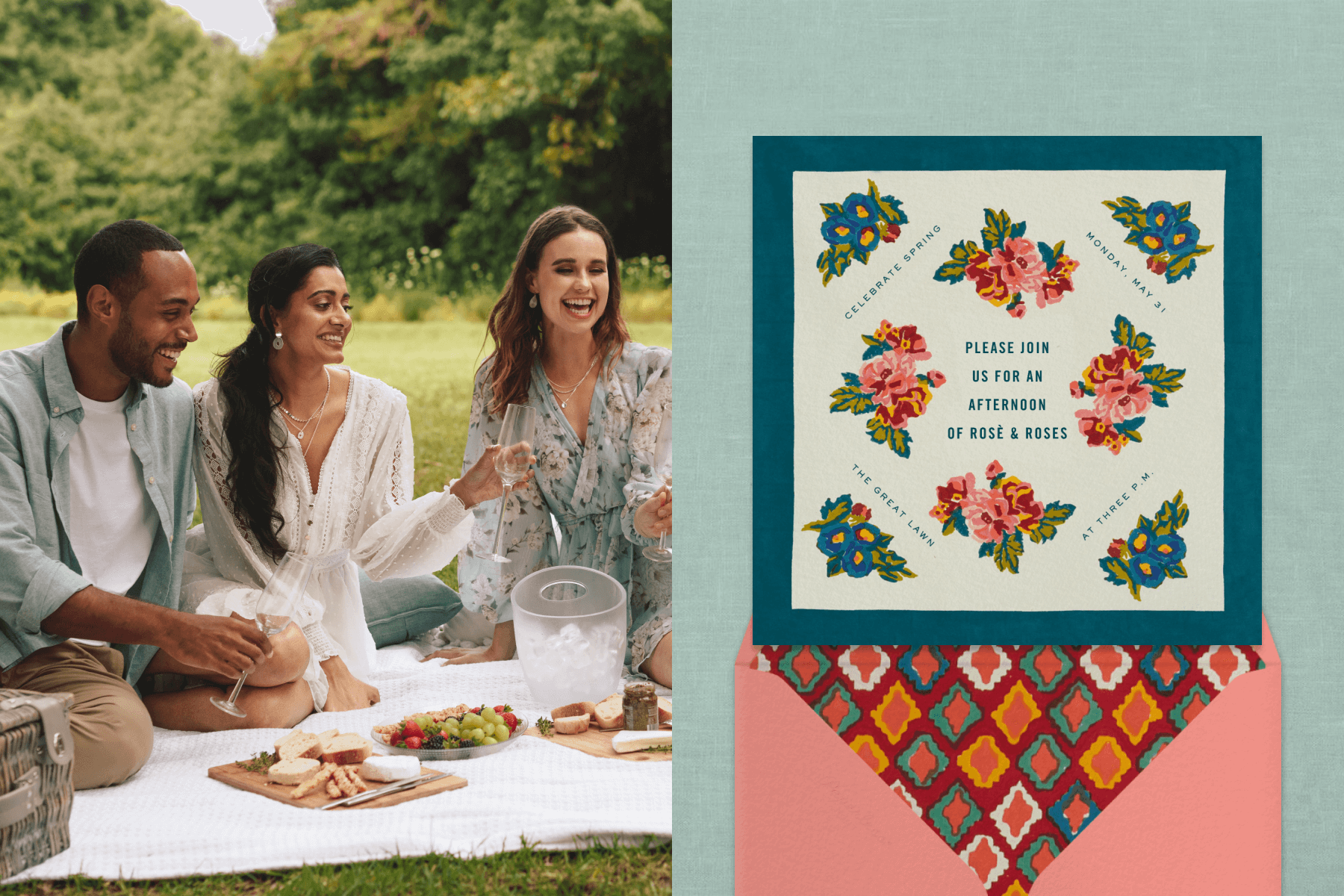 Three friends holding Champagne flutes sitting on a picnic blanket in the grass, with a cheese board, plate of fruit, picnic basket, and bucket of ice; an invitation with a turquoise border and floral imagery on a green background above a pink envelope.