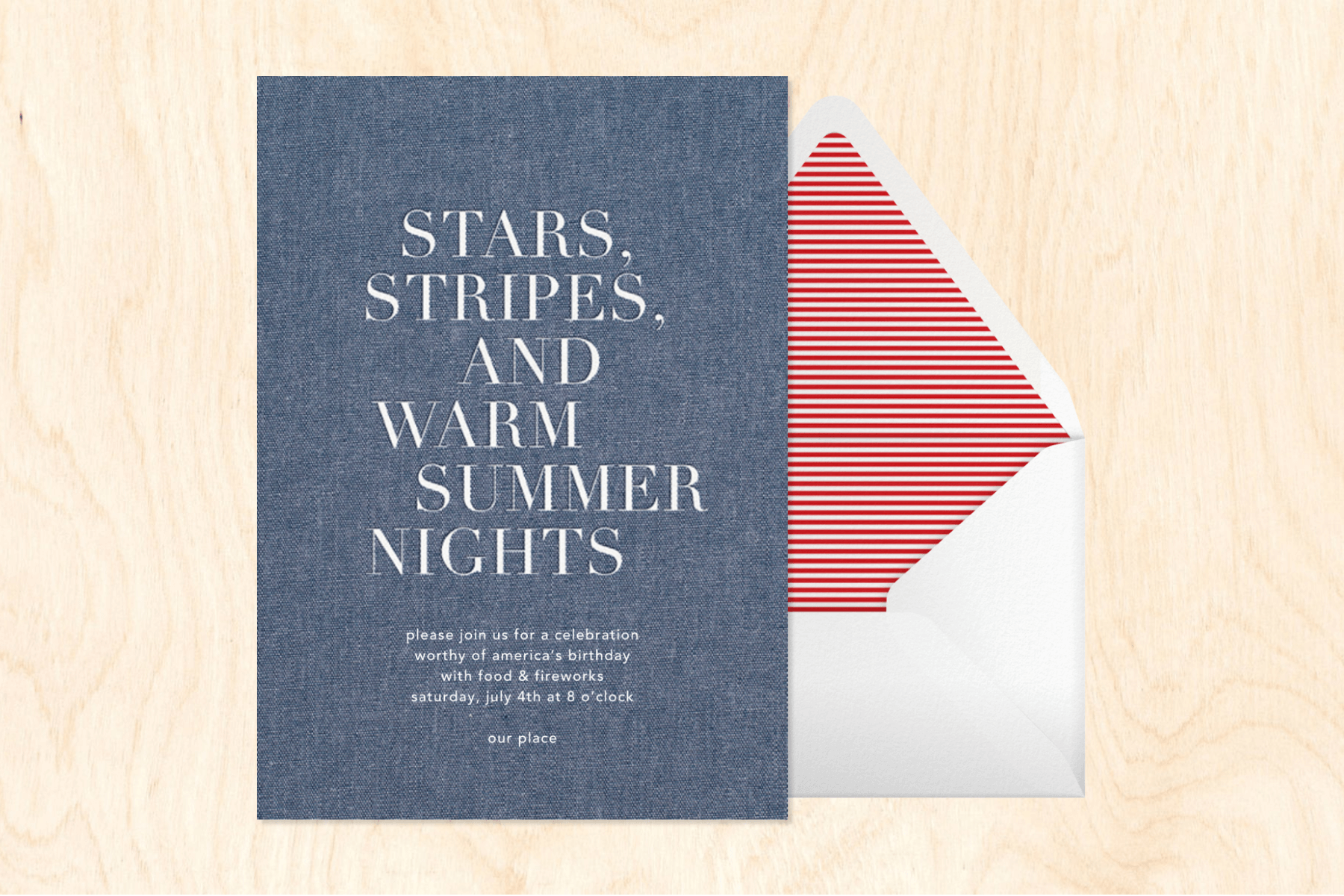 A chambray invitation reads STARS, STRIPES, AND WARM SUMMER NIGHTS beside a white envelope with red striped liner