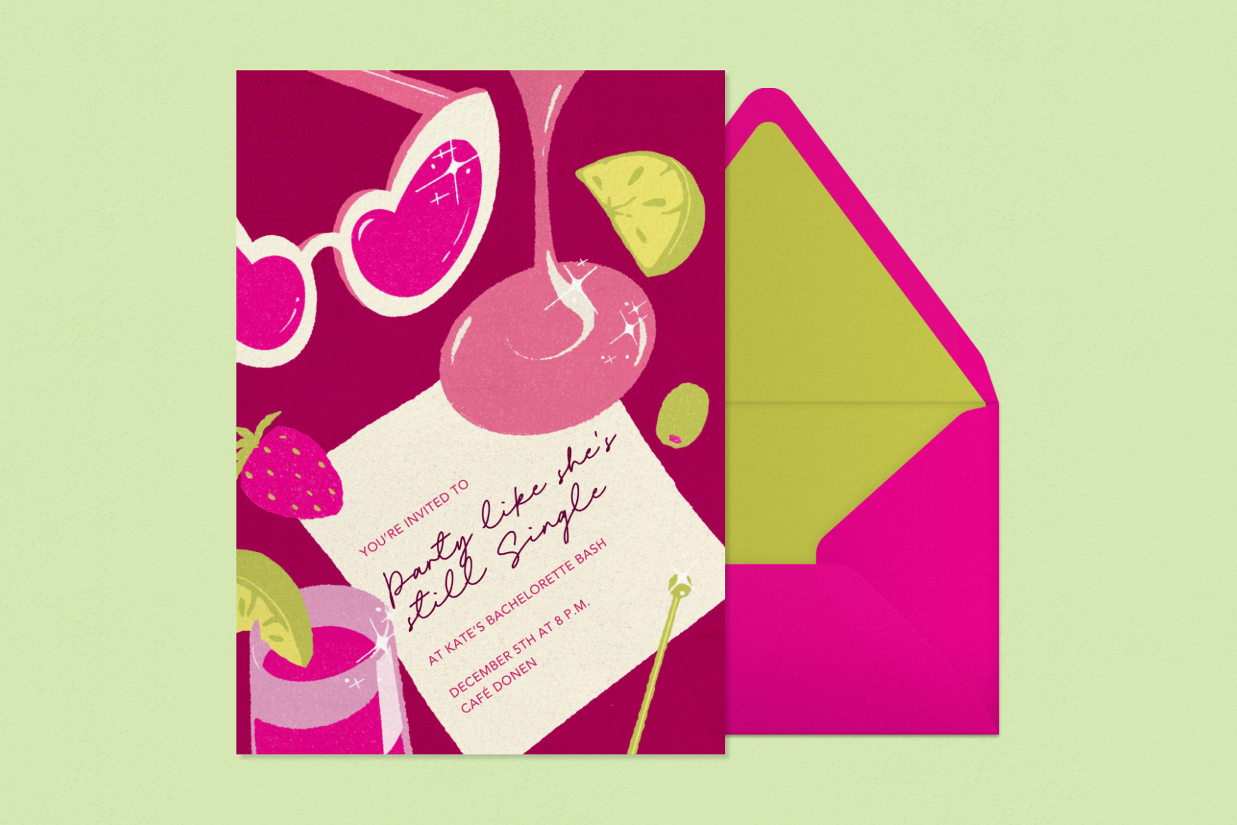 A pink invitation with heart-shaped sunglasses, a drink, strawberry, glass stem, garnishes, and cocktail napkin beside a pink and green envelope.
