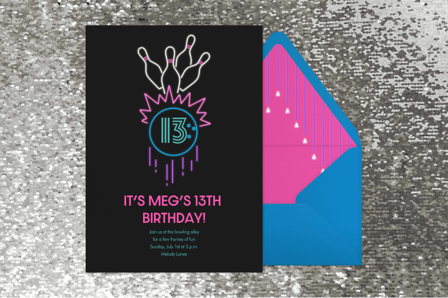 A black invitation with a colorful neon line illustration of a bowling ball hitting four pins next to a blue envelope with hot pink liner.