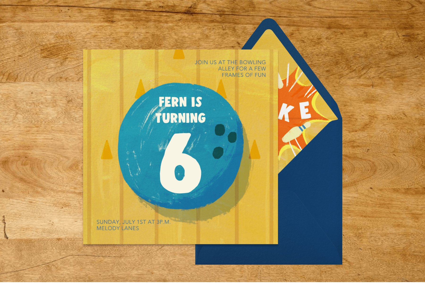 A square invitation with a blue bowling ball and the words FERN IS TURNING 6 on a yellow bowling alley background next to a navy envelope with a bowling-themed liner.